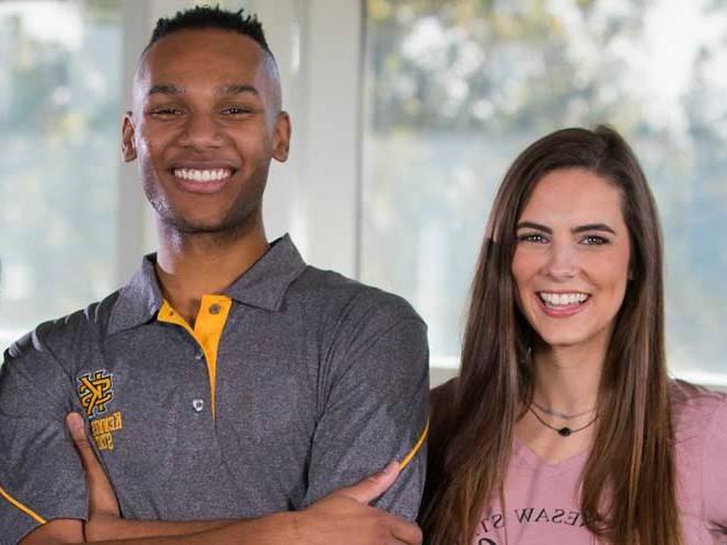 Man and woman smiling for a picture